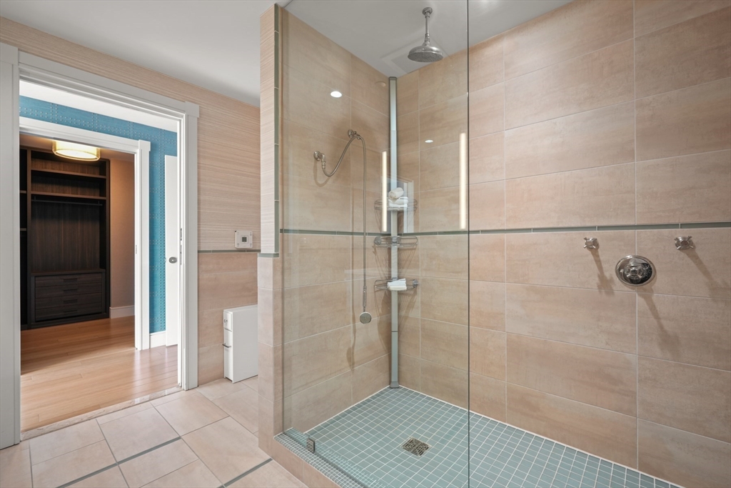 45 Province Street, Unit 2404 Boston, MA 02108 - Photo 16 of 32 a bathroom with a shower and a sink