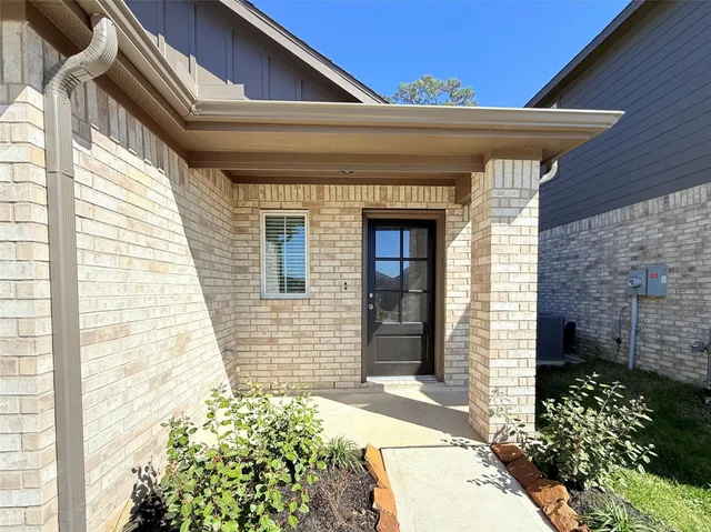 a front view of a house with a garage