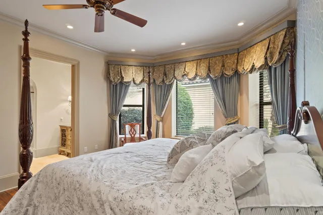 a kitchen with a granite countertop sink a stove and refrigerator
