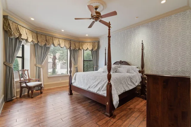 a view of a livingroom with furniture and a mirror