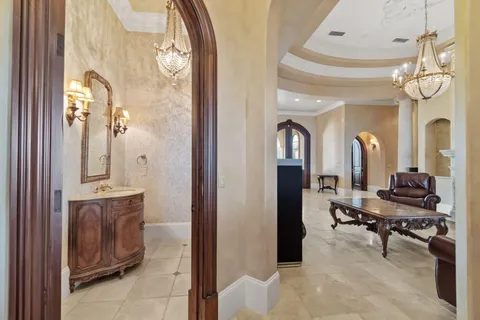 a view of hallway with wooden floor