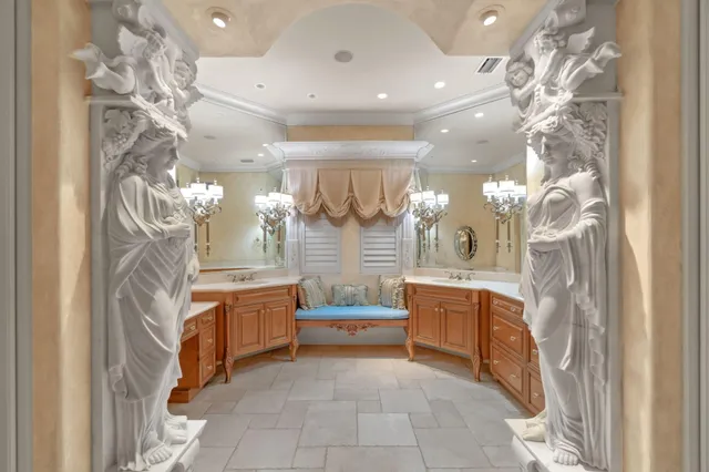 a bathroom with a sink vanity and a mirror