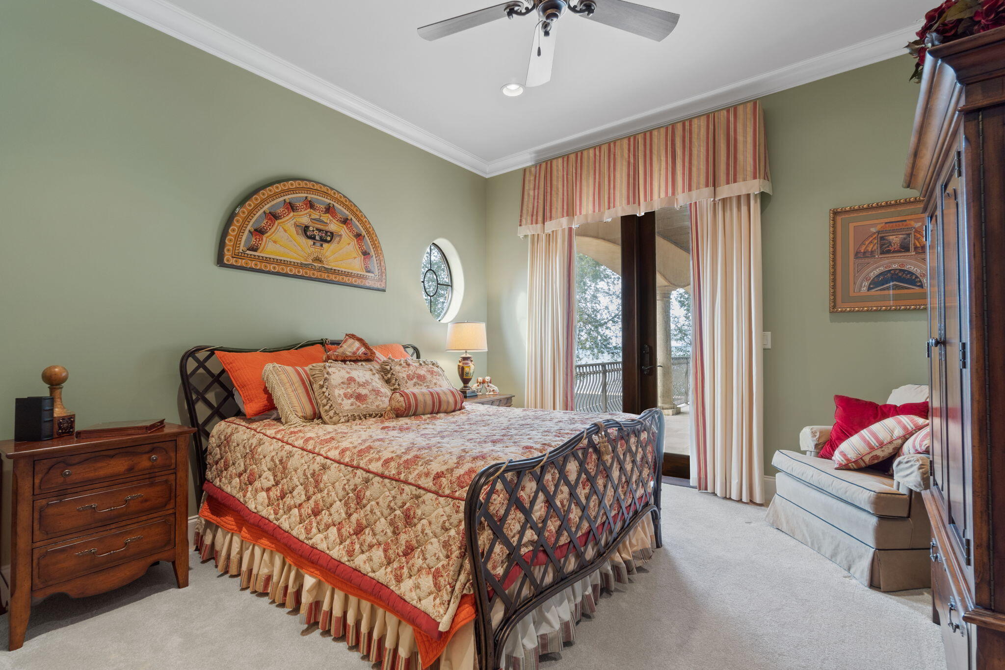 456 Captains Circle Destin, FL 32541 - Photo 44 of 85 a bedroom with a bed and a chandelier