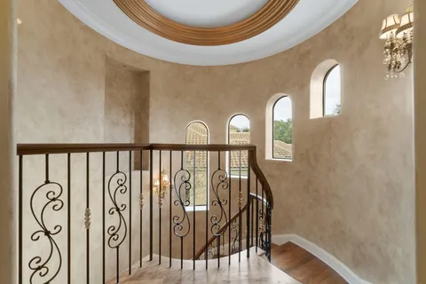 a view of a lake with a table and chairs