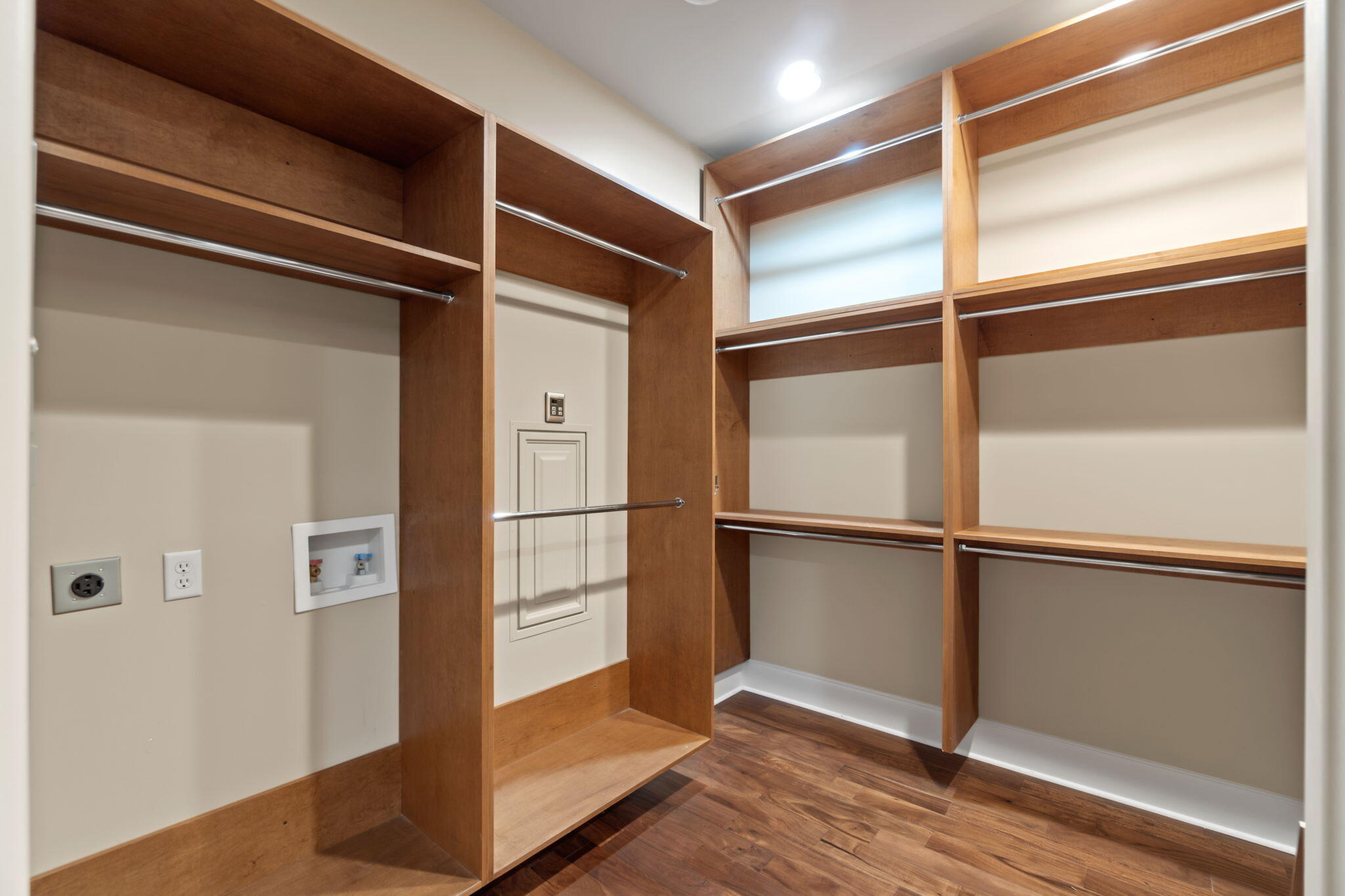 456 Captains Circle Destin, FL 32541 - Photo 50 of 85 a view of an empty room with wooden floor