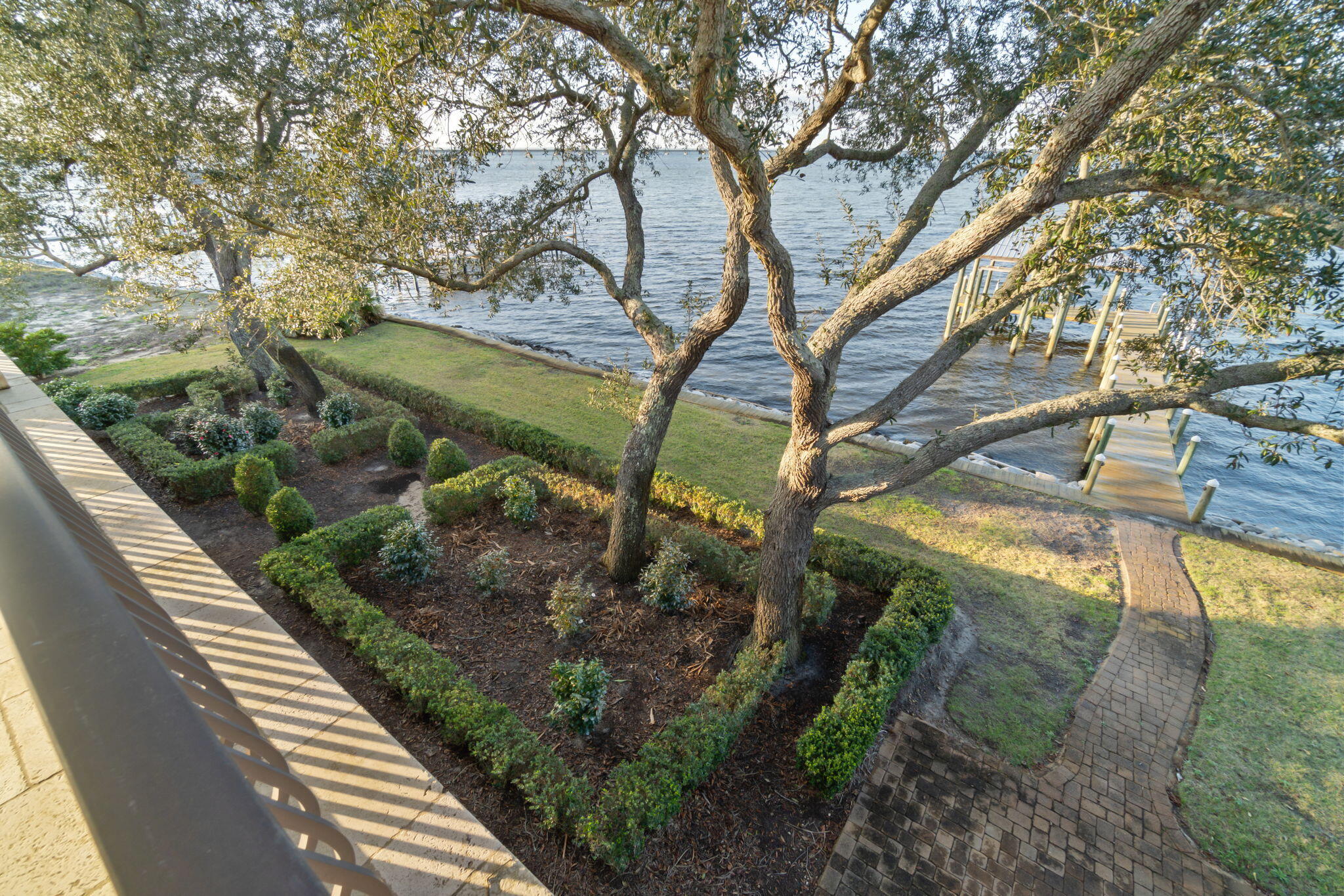 456 Captains Circle Destin, FL 32541 - Photo 54 of 85 a backyard of a house with lots of green space