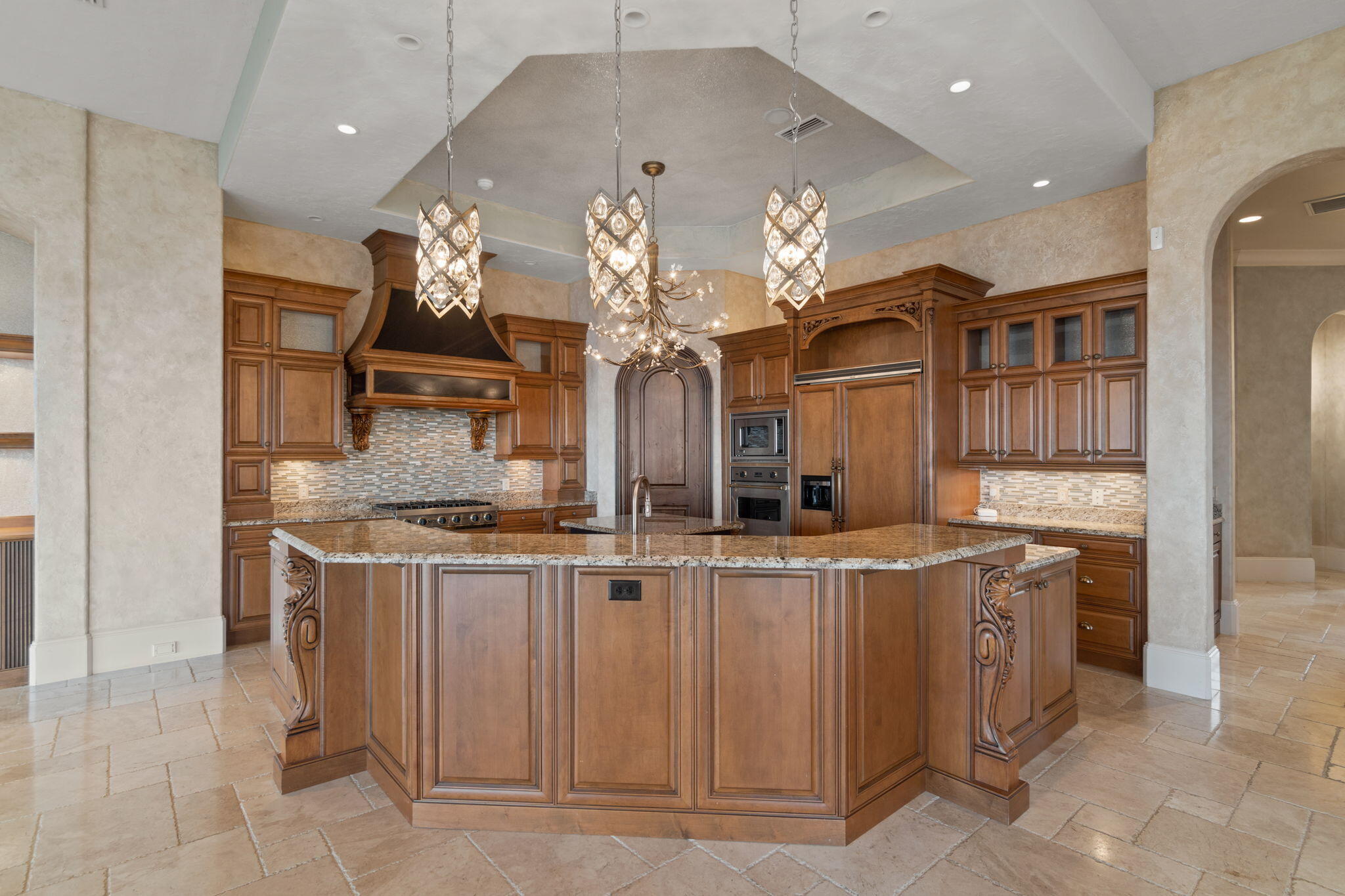 456 Captains Circle Destin, FL 32541 - Photo 6 of 85 a kitchen that has a lot of cabinets in it