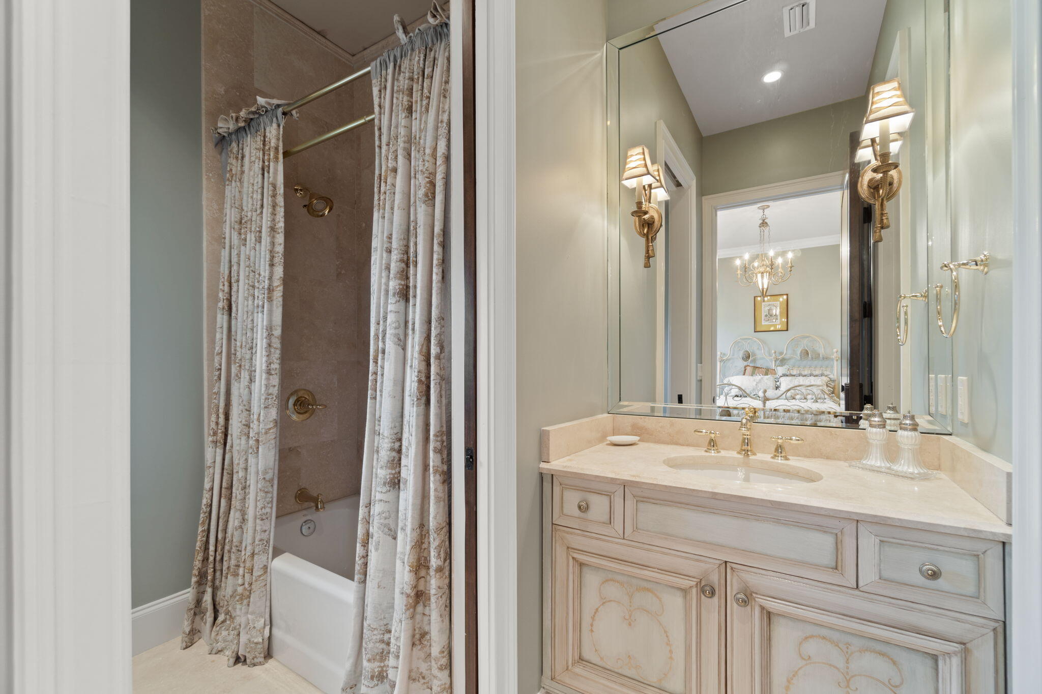 456 Captains Circle Destin, FL 32541 - Photo 61 of 85 a bathroom with a sink vanity and a mirror