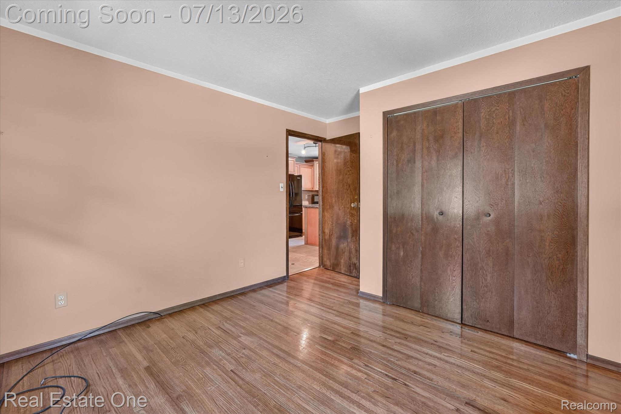 6039 Fish Lake Road Holly, MI 48442 - Photo 18 of 70 Hardwood flooring in main floor bedroom