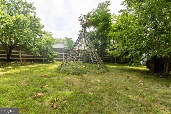 a view of backyard with green space