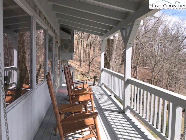 990 Fox Meadow Road Banner Elk, NC 28604 - Photo 12 of 45 a view of a balcony with chairs