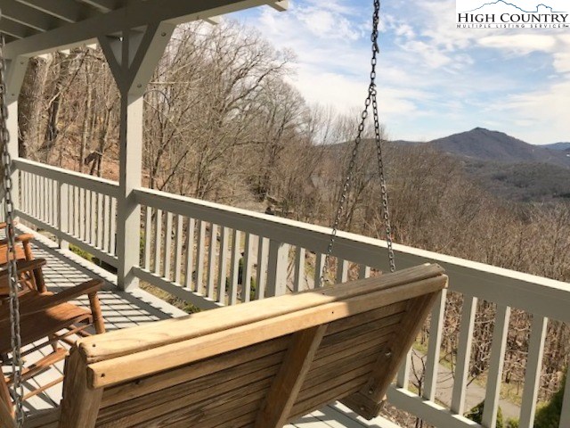 990 Fox Meadow Road Banner Elk, NC 28604 - Photo 13 of 45 a view of balcony with wooden floor and fence