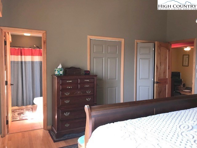 990 Fox Meadow Road Banner Elk, NC 28604 - Photo 29 of 45 a bedroom with a bed and a dresser