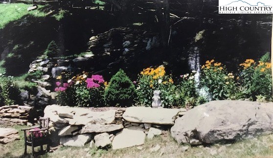 990 Fox Meadow Road Banner Elk, NC 28604 - Photo 42 of 45 a view of a backyard of a house