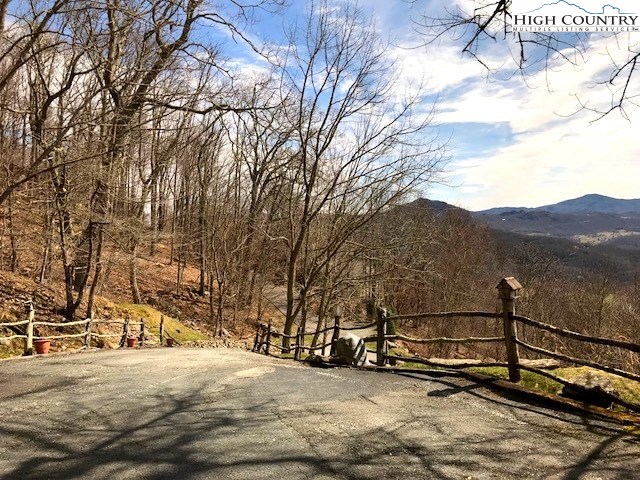 990 Fox Meadow Road Banner Elk, NC 28604 - Photo 5 of 45 a view of a street with a tree in the background