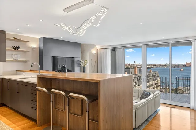 a kitchen with counter top space and appliances