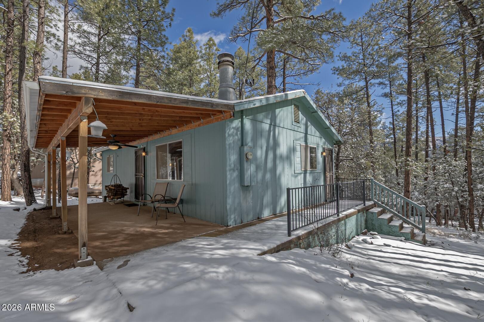 3741 Cochise Lane Pine, AZ 85544 - Photo 16 of 21 a view of a house with a outdoor space