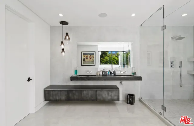 a kitchen with a stove and a refrigerator