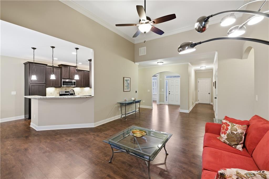 308 Morning Frost Canton, GA 30114 - Photo 12 of 41 a living room with furniture and wooden floor