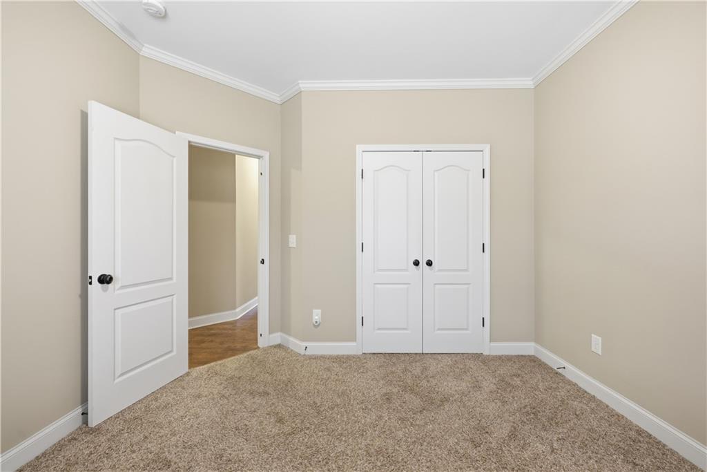 308 Morning Frost Canton, GA 30114 - Photo 21 of 41 a view of an empty room