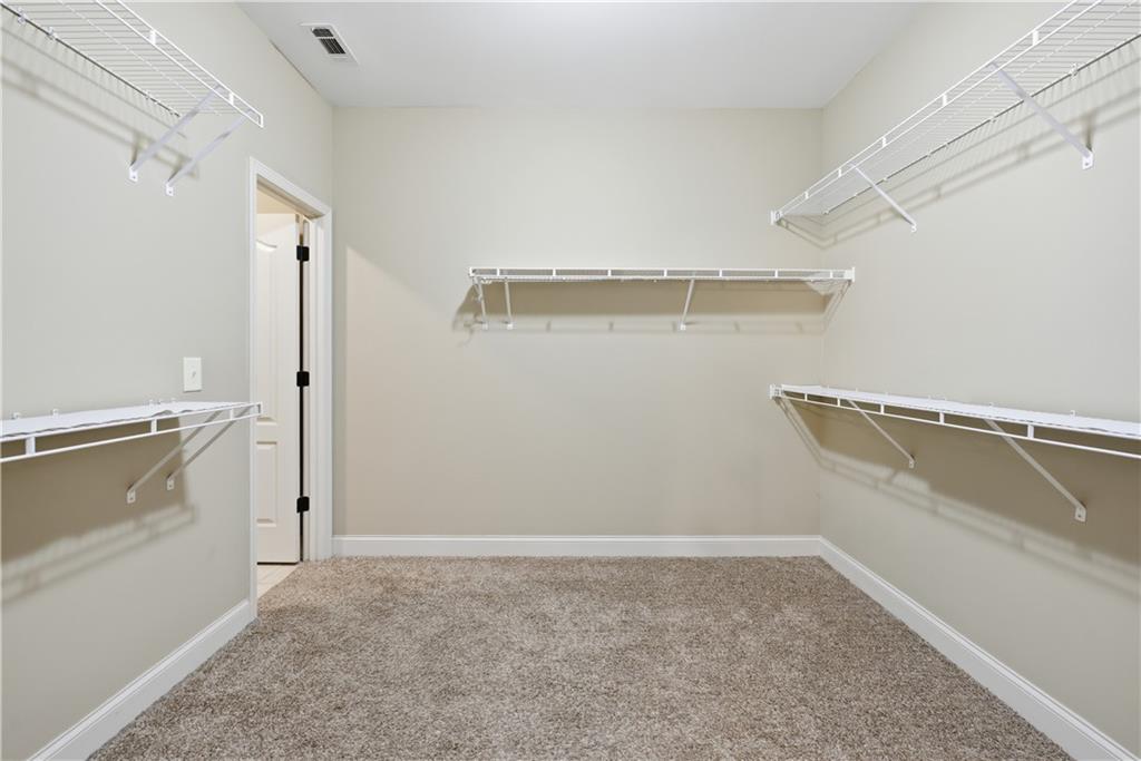308 Morning Frost Canton, GA 30114 - Photo 30 of 41 a view of storage and utility room with closet