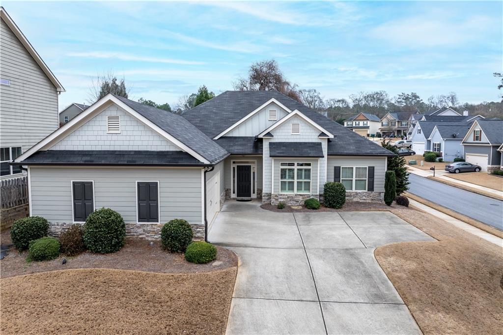 308 Morning Frost Canton, GA 30114 - Photo 39 of 41 a front view of a house with a yard