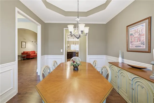 a spacious bathroom with a double vanity sink and a mirror