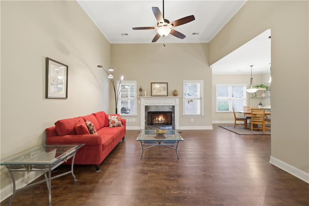 308 Morning Frost Canton, GA 30114 - Photo 9 of 41 a living room with furniture fireplace and window