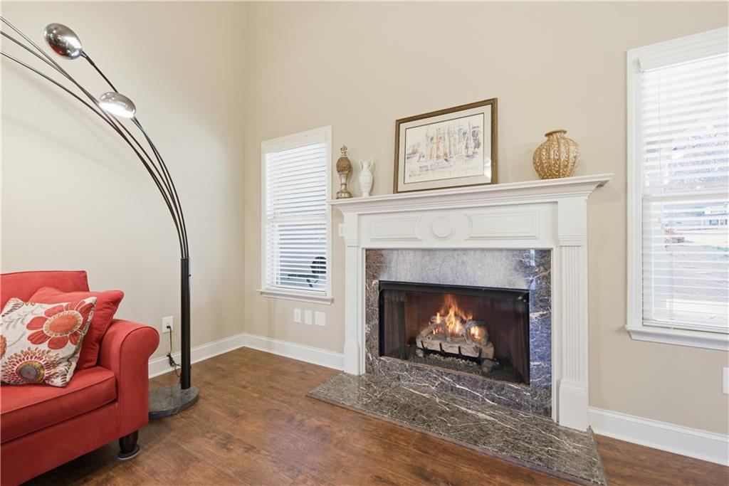 308 Morning Frost Canton, GA 30114 - Photo 10 of 41 a living room with furniture and a fireplace