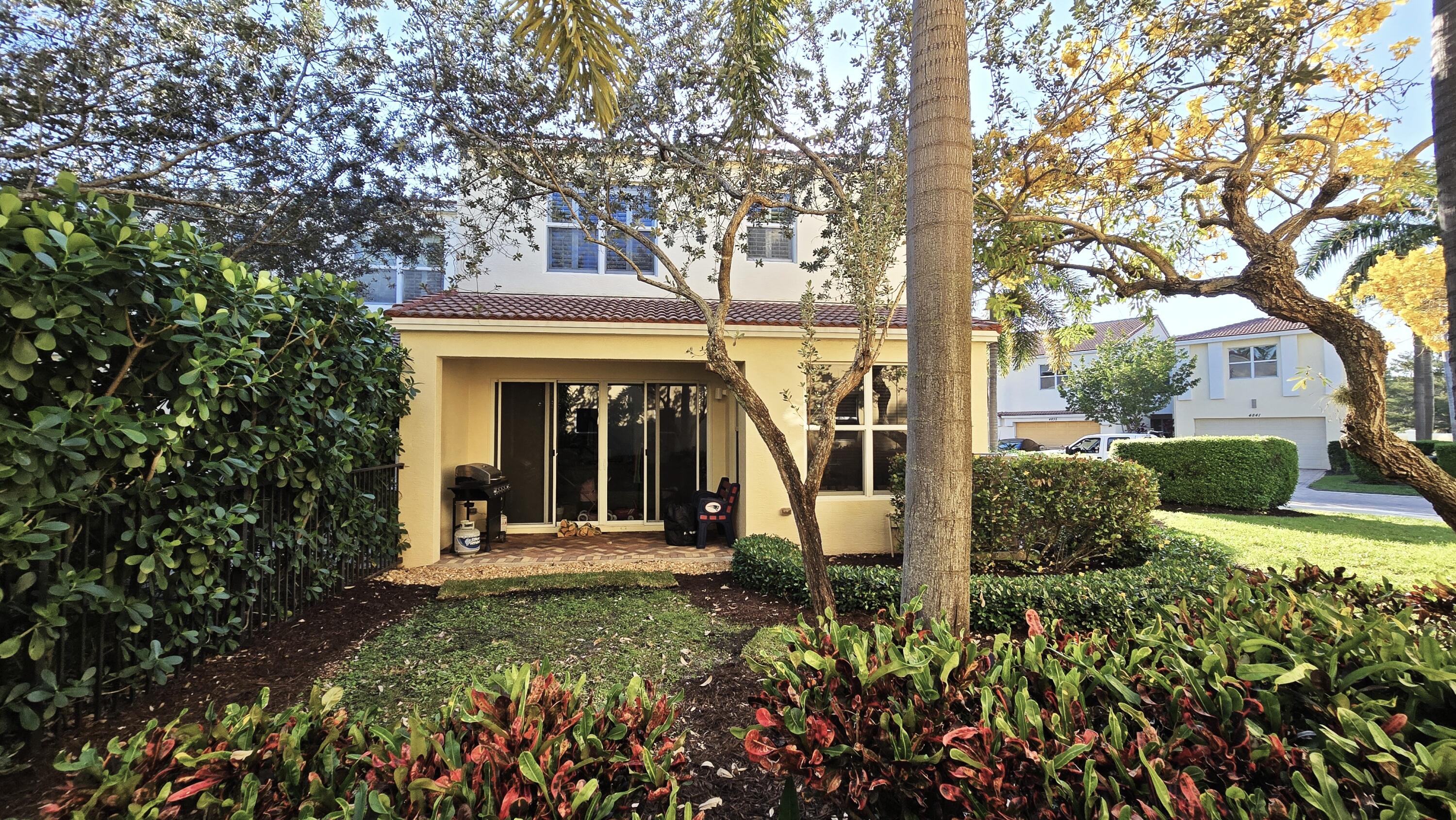 4820 Northwest 16th Terrace Boca Raton, FL 33431 - Photo 28 of 39 88 4 4820 bk patio str8 on