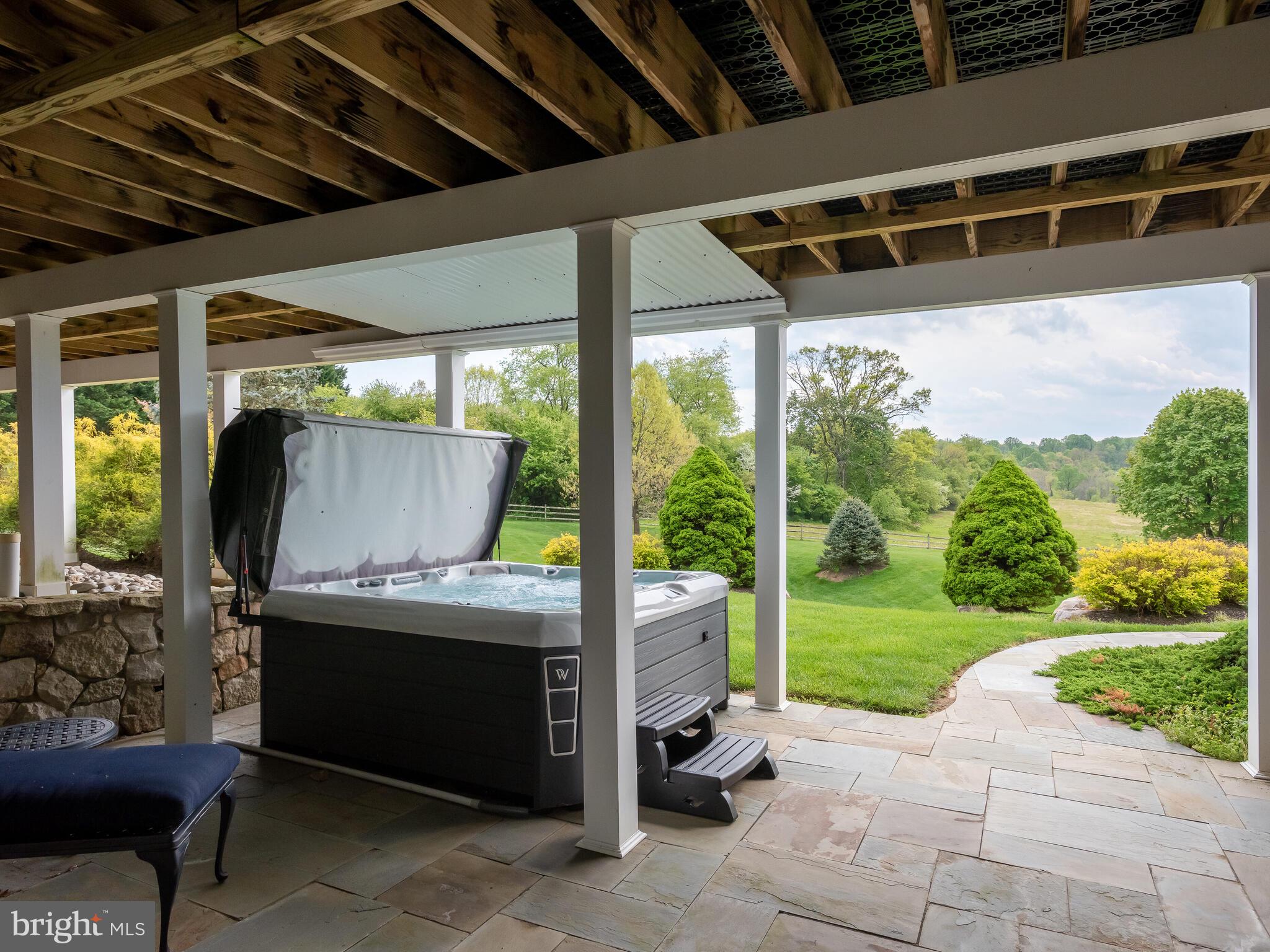 1 Hedgerow Lane Devon, PA 19333 - Photo 57 of 71 Back patio hot tub-entry from finished lower level