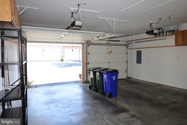 a view of a room with wooden walls