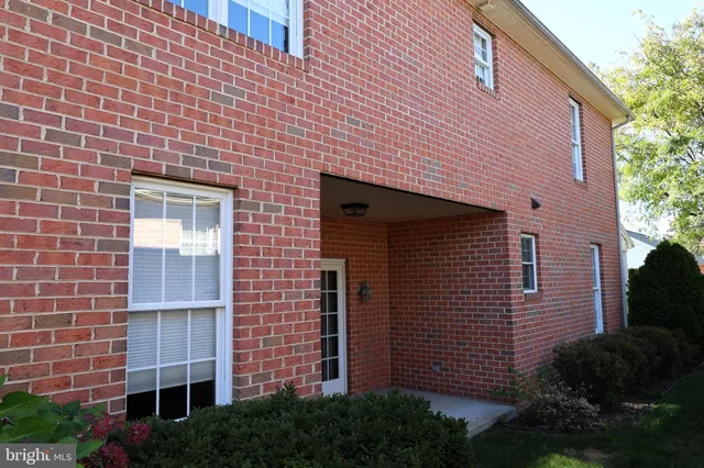 a view of front door of house with a window