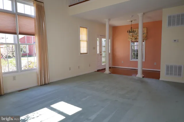 an empty room with windows