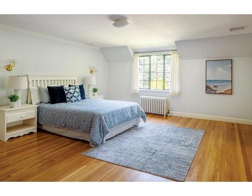 20 Metacomet Road Newton, MA 02468 - Photo 11 of 13 a bedroom with a bed and wooden floor