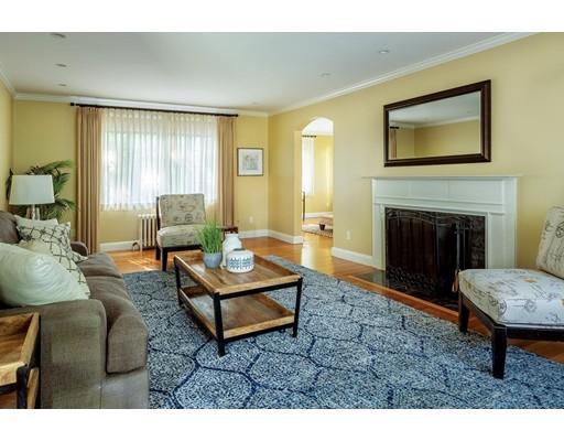 20 Metacomet Road Newton, MA 02468 - Photo 4 of 13 a living room with furniture and a fireplace