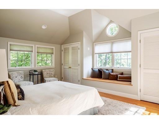 20 Metacomet Road Newton, MA 02468 - Photo 8 of 13 a large bedroom with a large bed and a large window