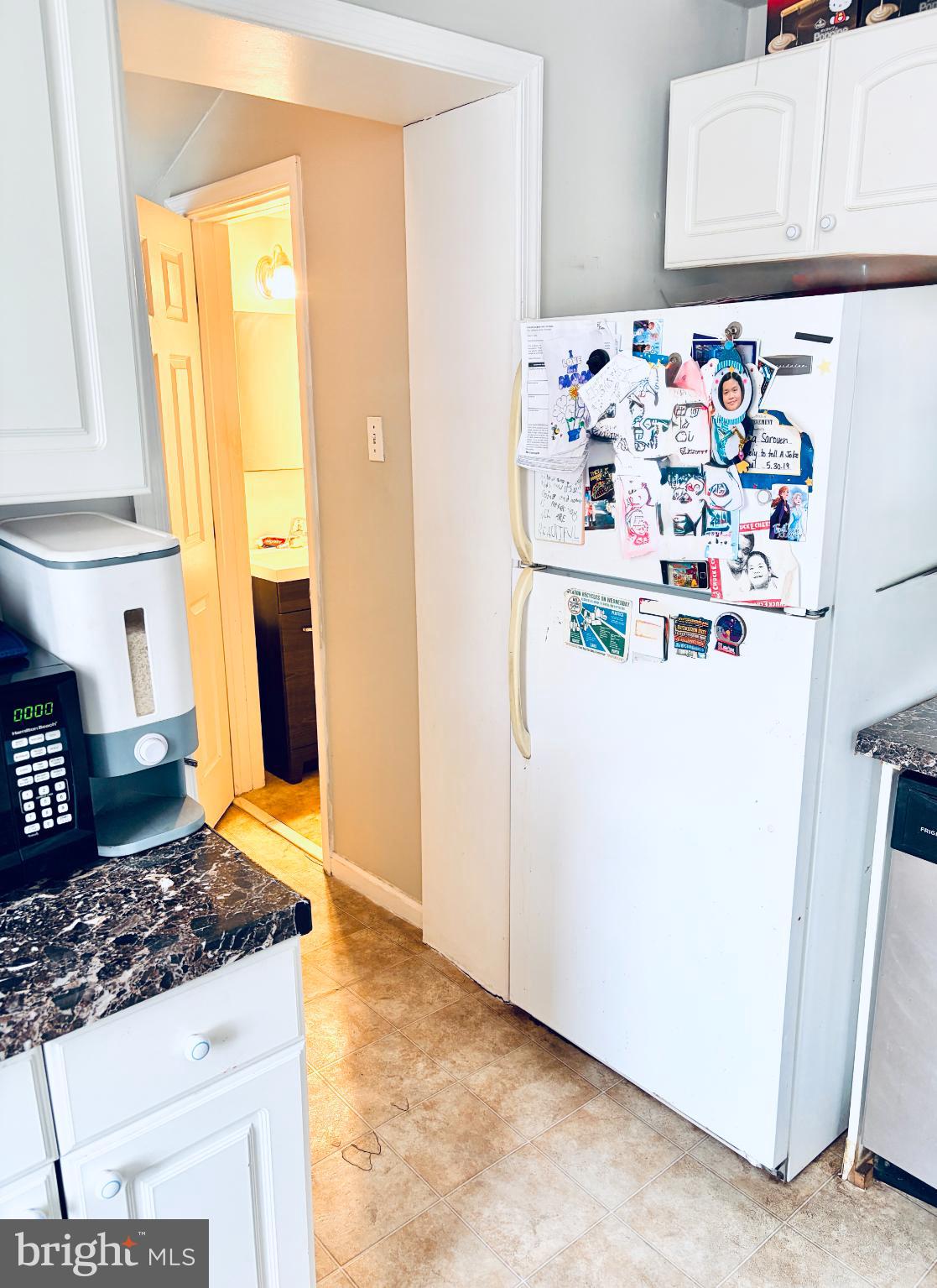 401 Holly Road Yeadon, PA 19050 - Photo 17 of 33 back area of house, half bath and laundry