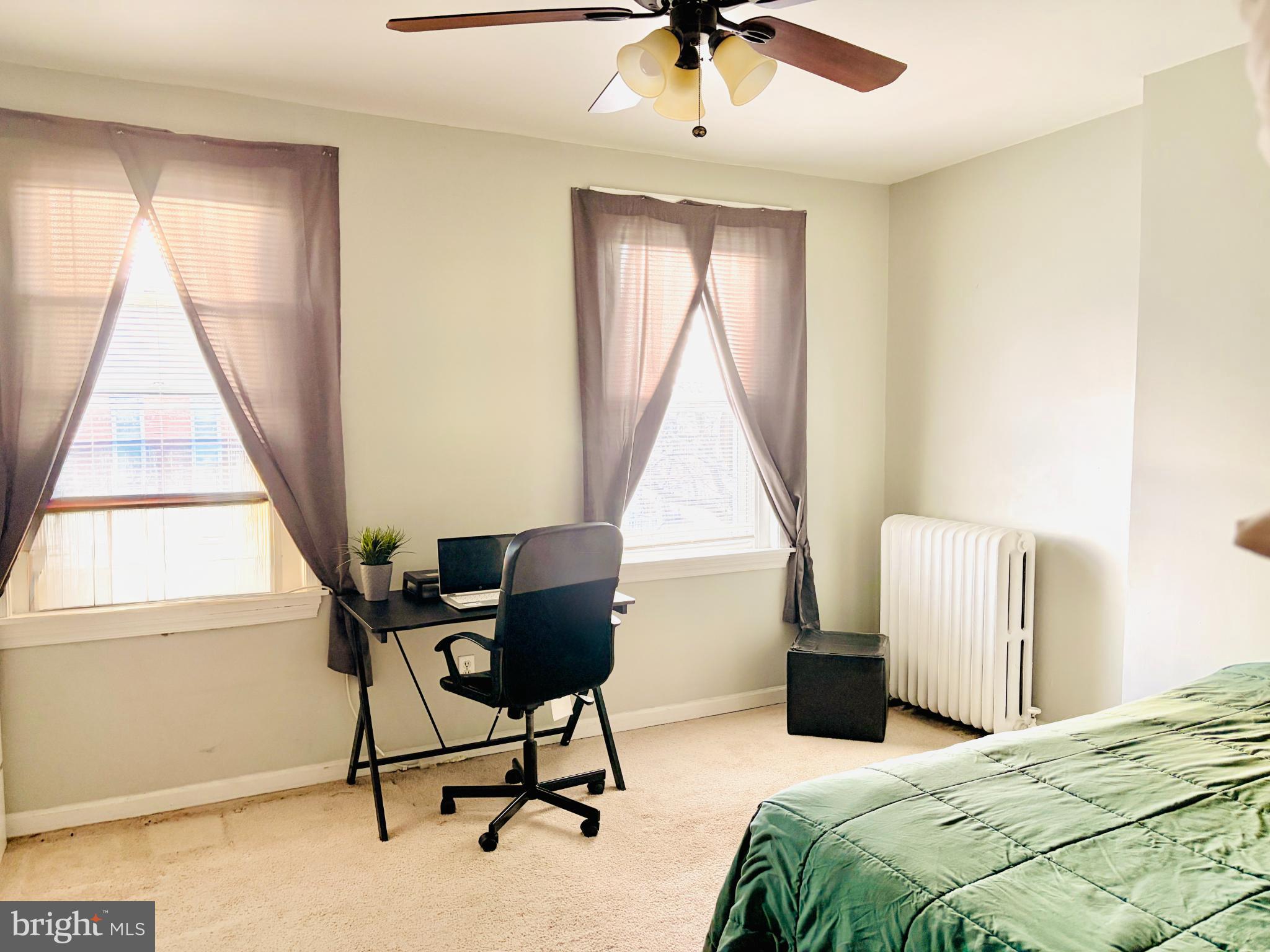 401 Holly Road Yeadon, PA 19050 - Photo 25 of 33 master bedroom facing the front of the house