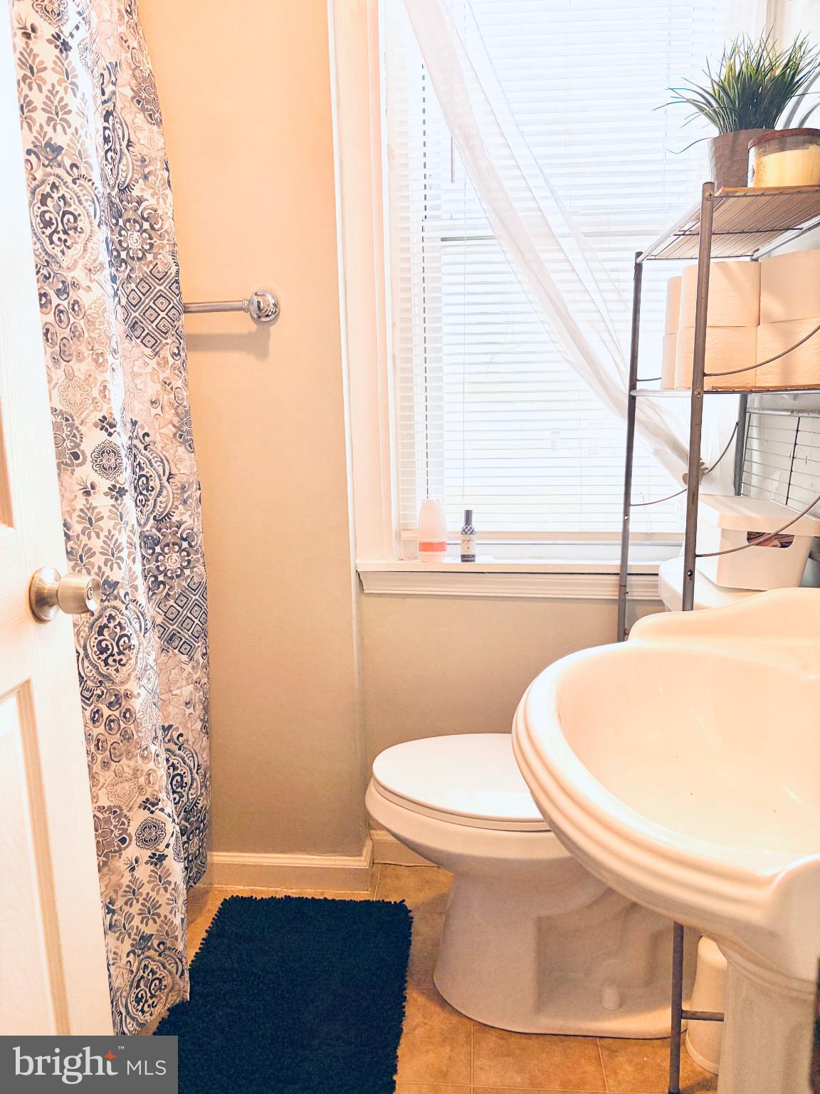 401 Holly Road Yeadon, PA 19050 - Photo 28 of 33 3 piece bathroom with shower/tub combo