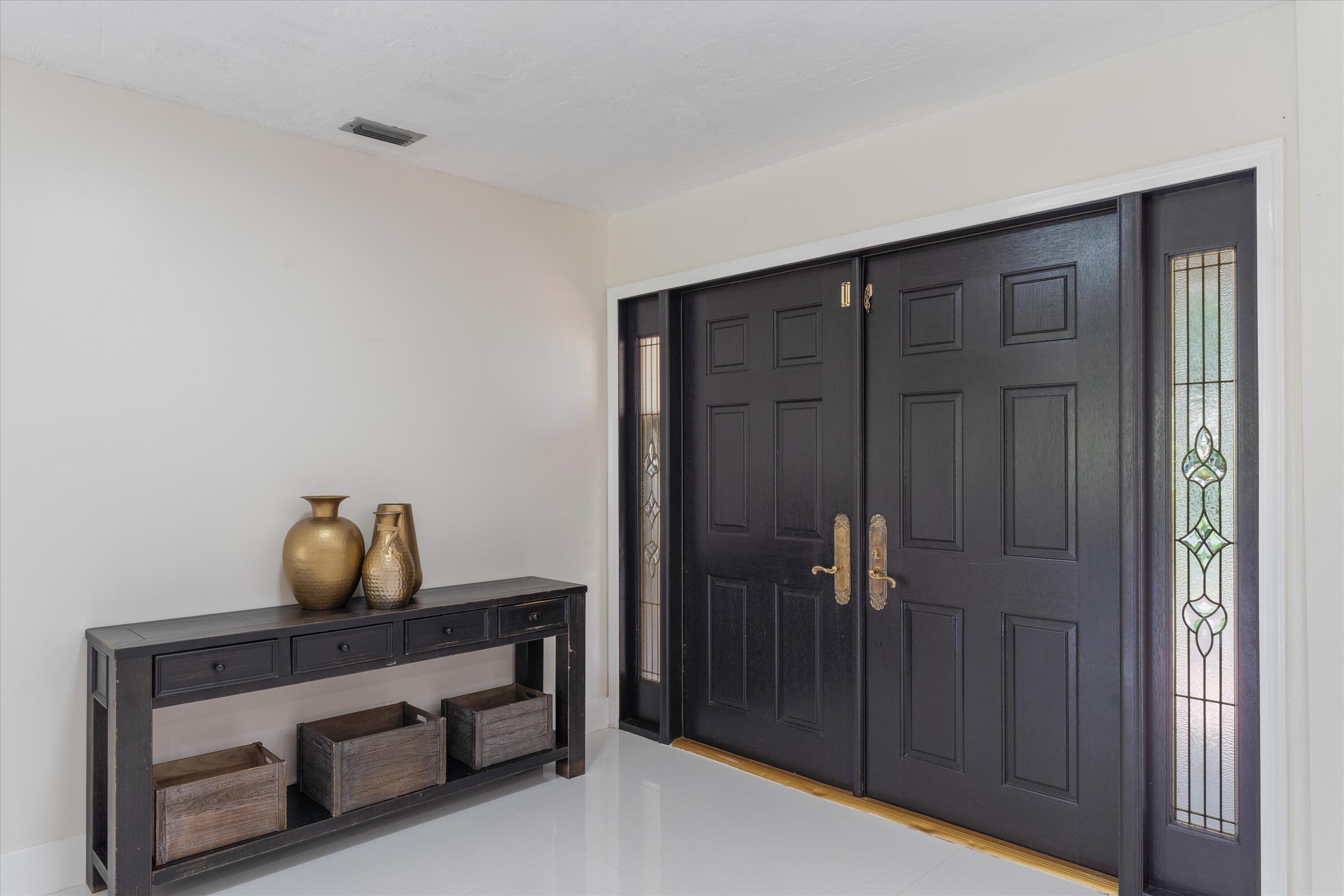 516 Muirfield Drive Atlantis, FL 33462 - Photo 5 of 43 a room way with closet