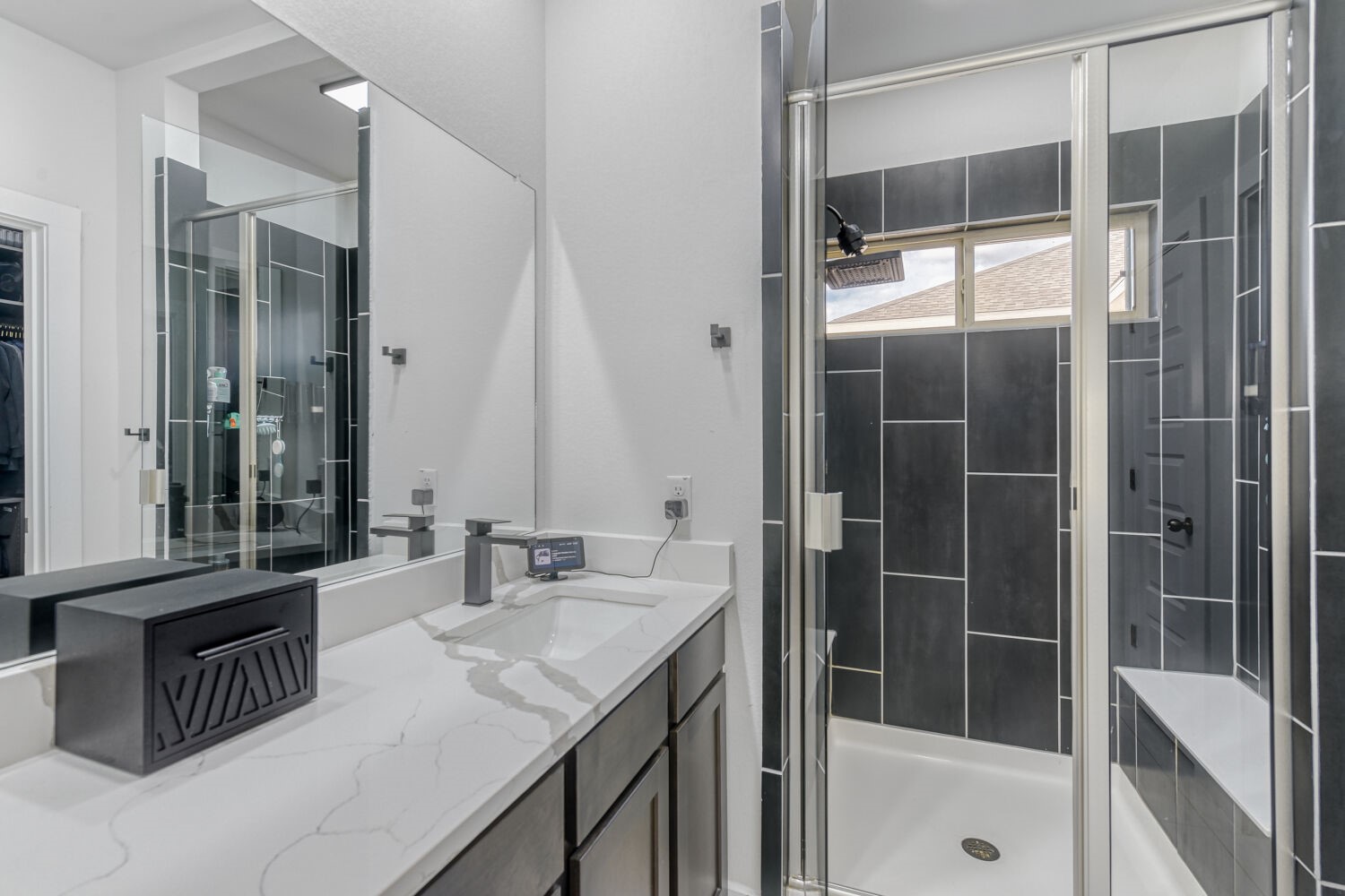 504 Spinnaker Loop Kyle, TX 78640 - Photo 11 of 17 Full bath with vanity, a stall shower, and a spacious closet