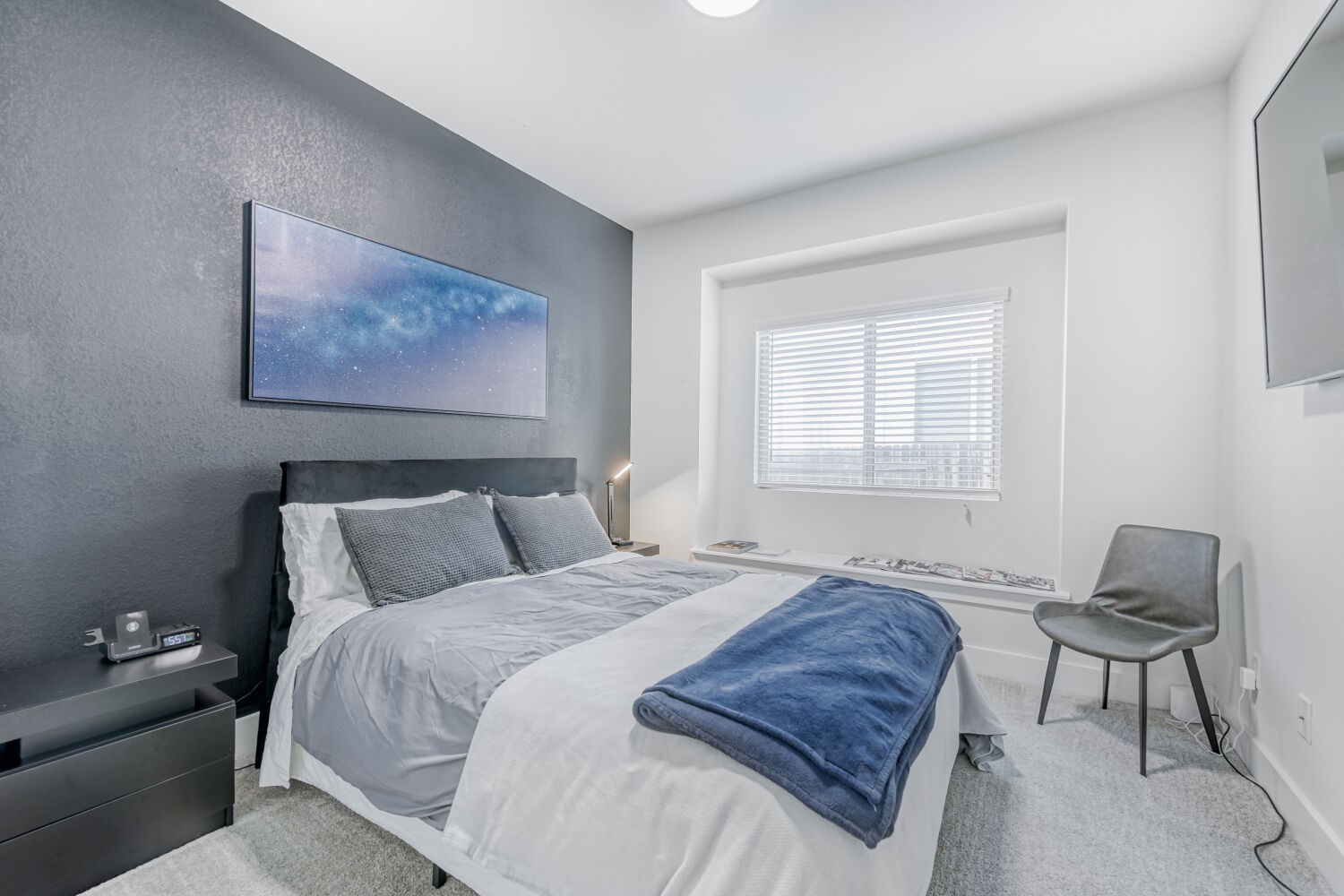 504 Spinnaker Loop Kyle, TX 78640 - Photo 13 of 17 Bedroom with carpet flooring and a textured wall