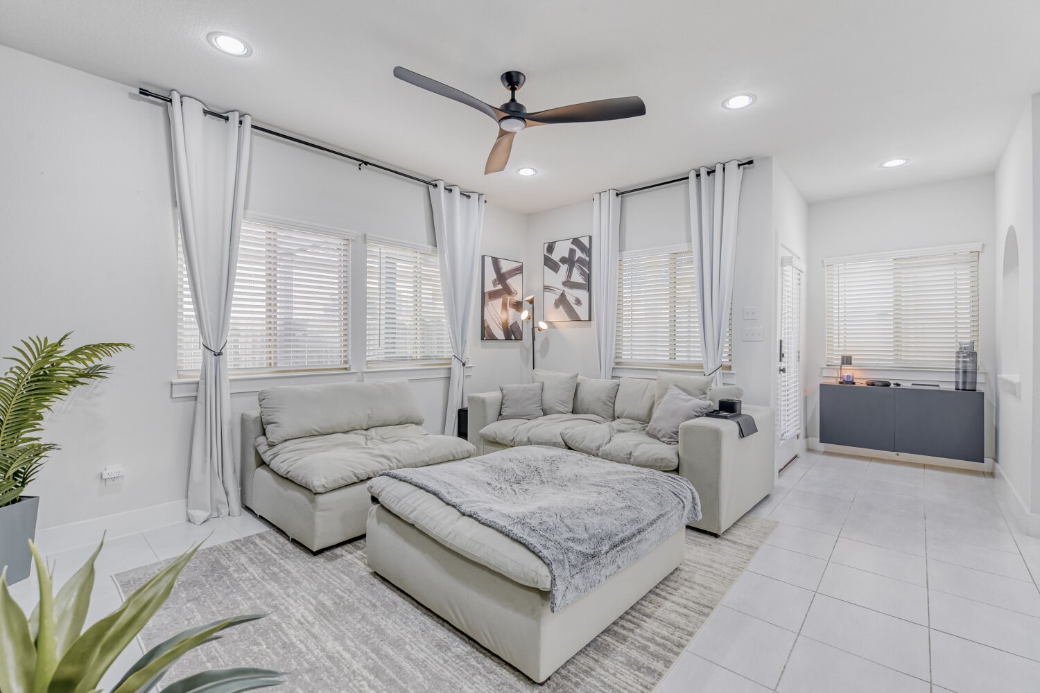 504 Spinnaker Loop Kyle, TX 78640 - Photo 3 of 17 Living area featuring ceiling fan, light tile patterned floors, and recessed lighting
