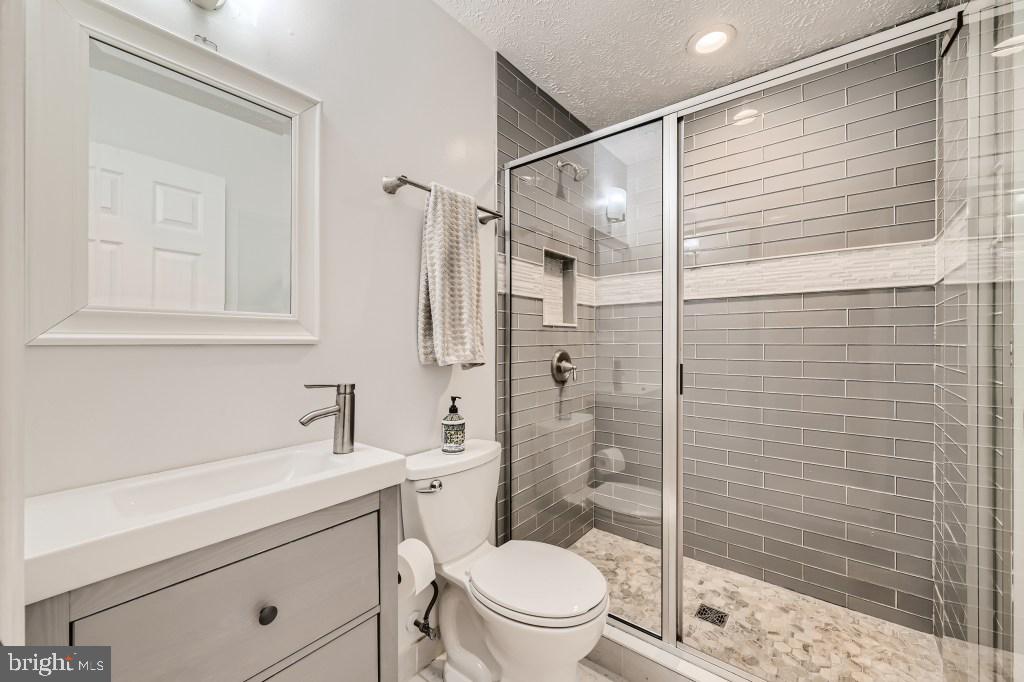 2011 Silver Lane Road Essex, MD 21221 - Photo 12 of 36 Recently updated bathroom / glass shower doors