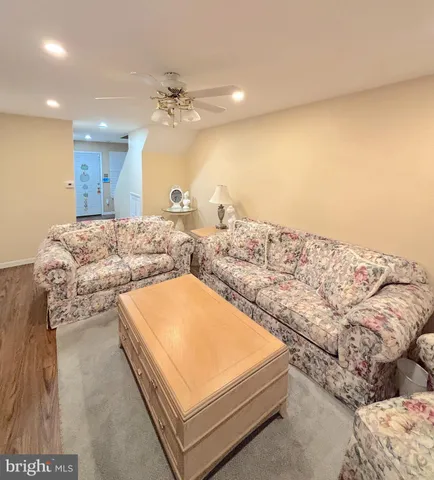 a living room with a bed