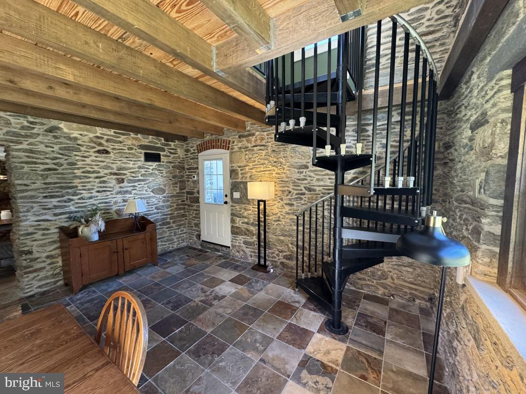 1375 South Bailey Road Coatesville, PA 19320 - Photo 28 of 88 Spiral staircase leads from DR to Main floor
