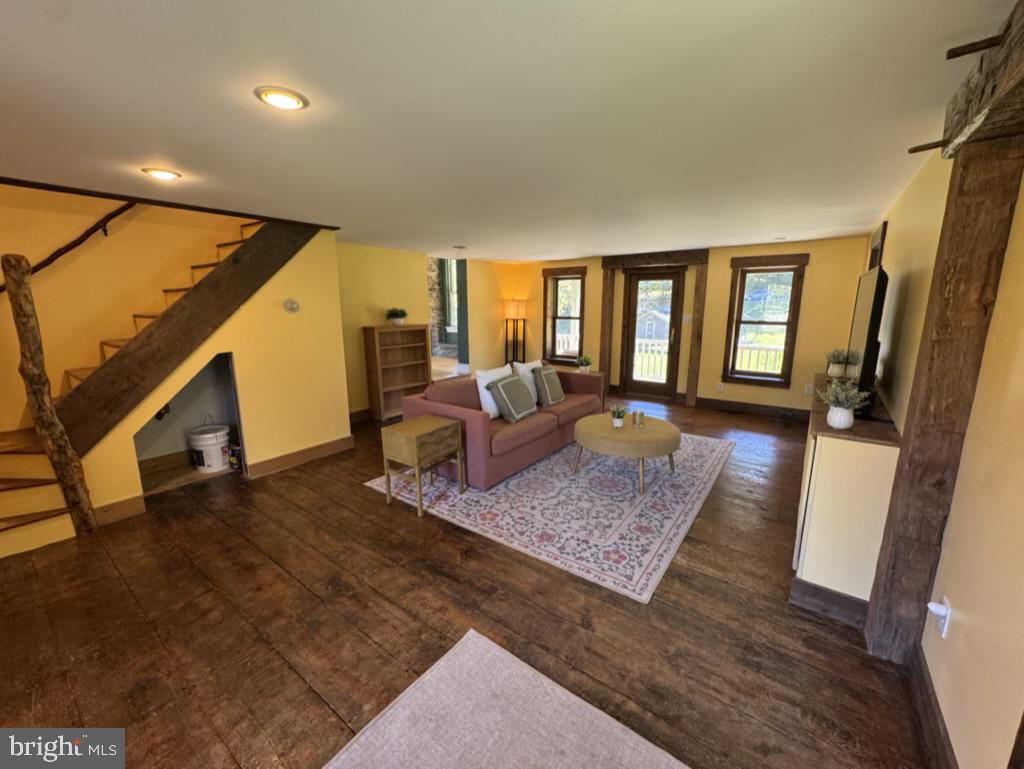 1375 South Bailey Road Coatesville, PA 19320 - Photo 44 of 88 Living Room with barnwood floors and exposed beams