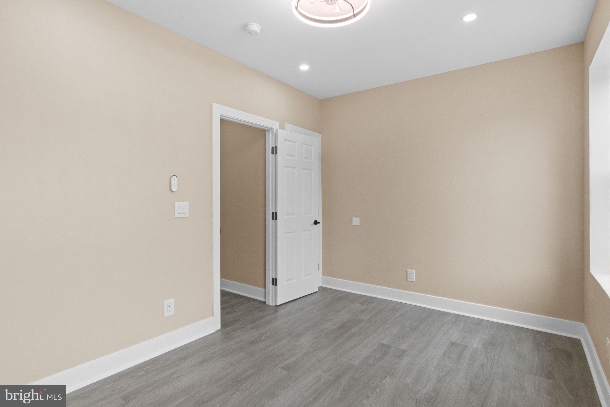 2839 North 9th Street, Unit 1 Philadelphia, PA 19133 - Photo 9 of 19 a view of an empty room with wooden floor