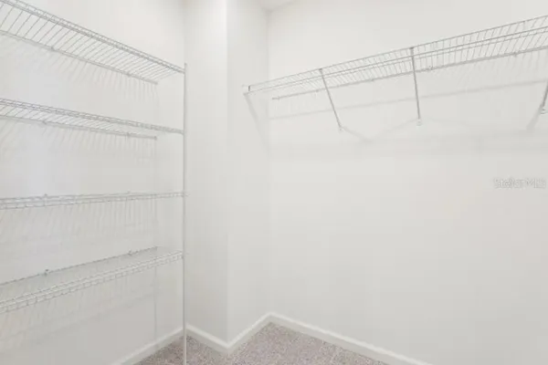 a view of an empty walk in closet